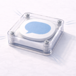 A transparent square housing contains a circular chat icon button secured with visible screws, suggesting a tactile interface.